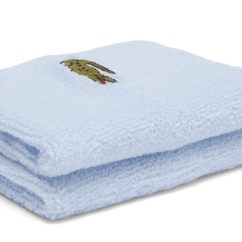 Poignets éponge Lacoste bleu clair
