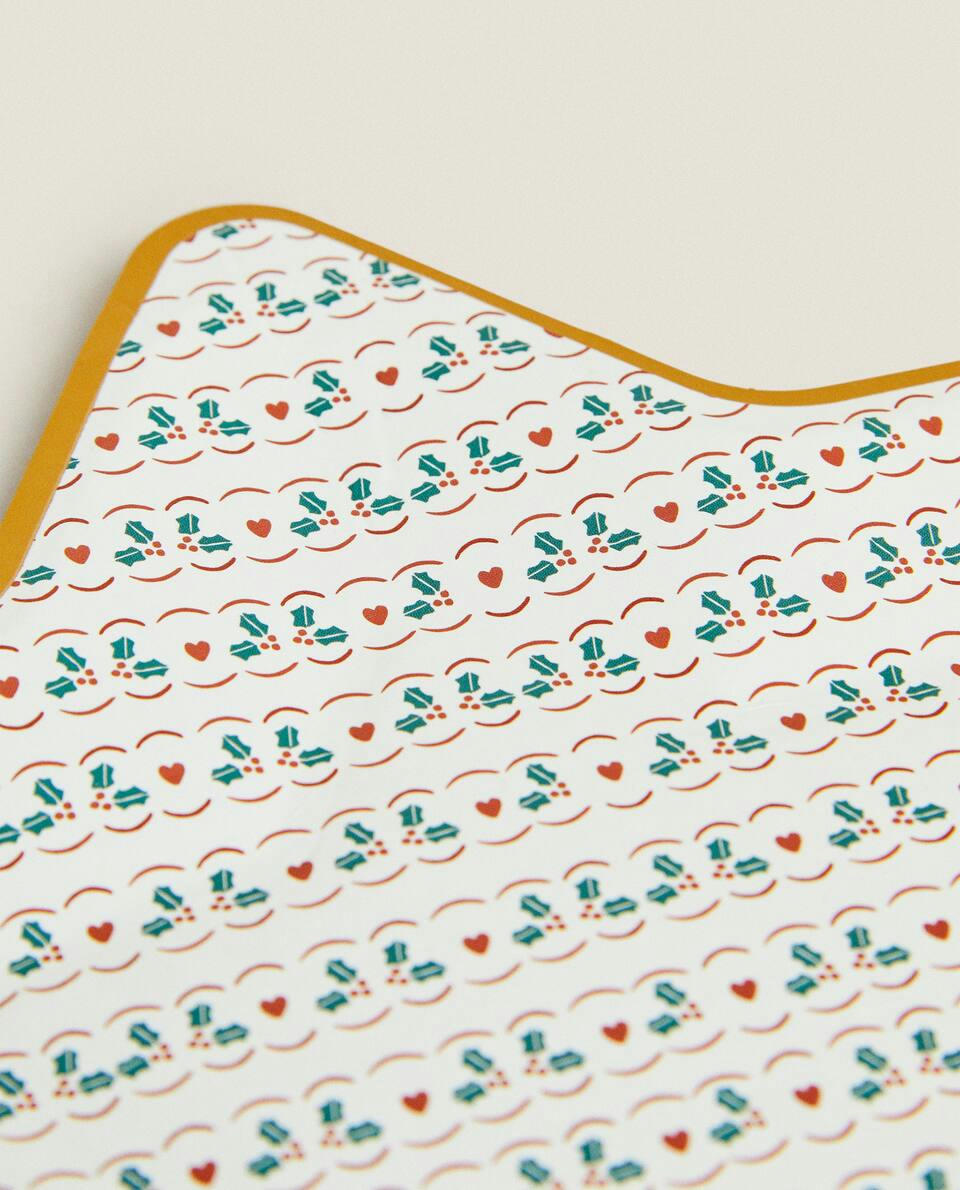 Pacote com 12 pratos de papel infantis em formato de estrela de Natal.