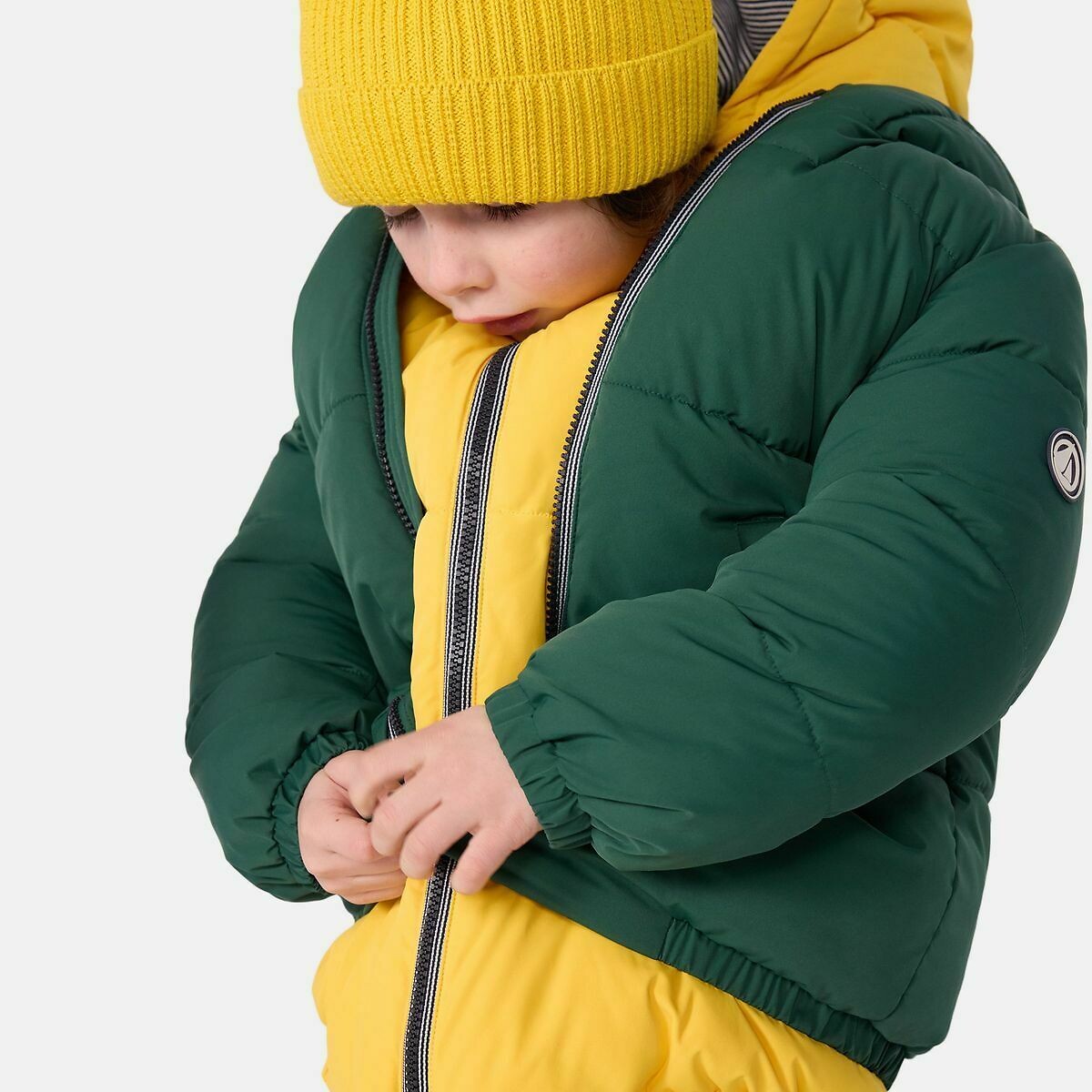 PETIT BATEAU<br>Jaqueta de penas com capuz