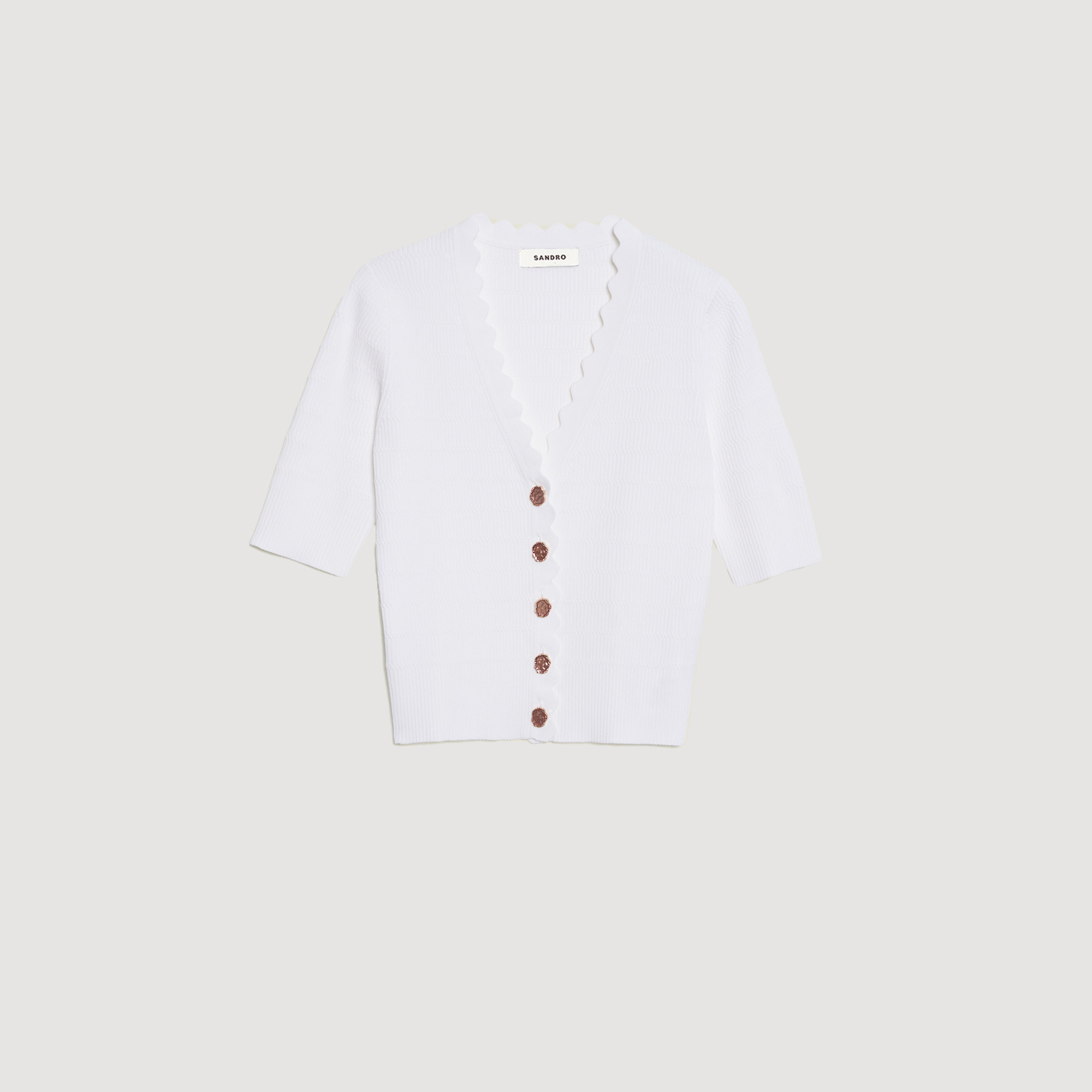 Pull en maille et boutons fantaisie