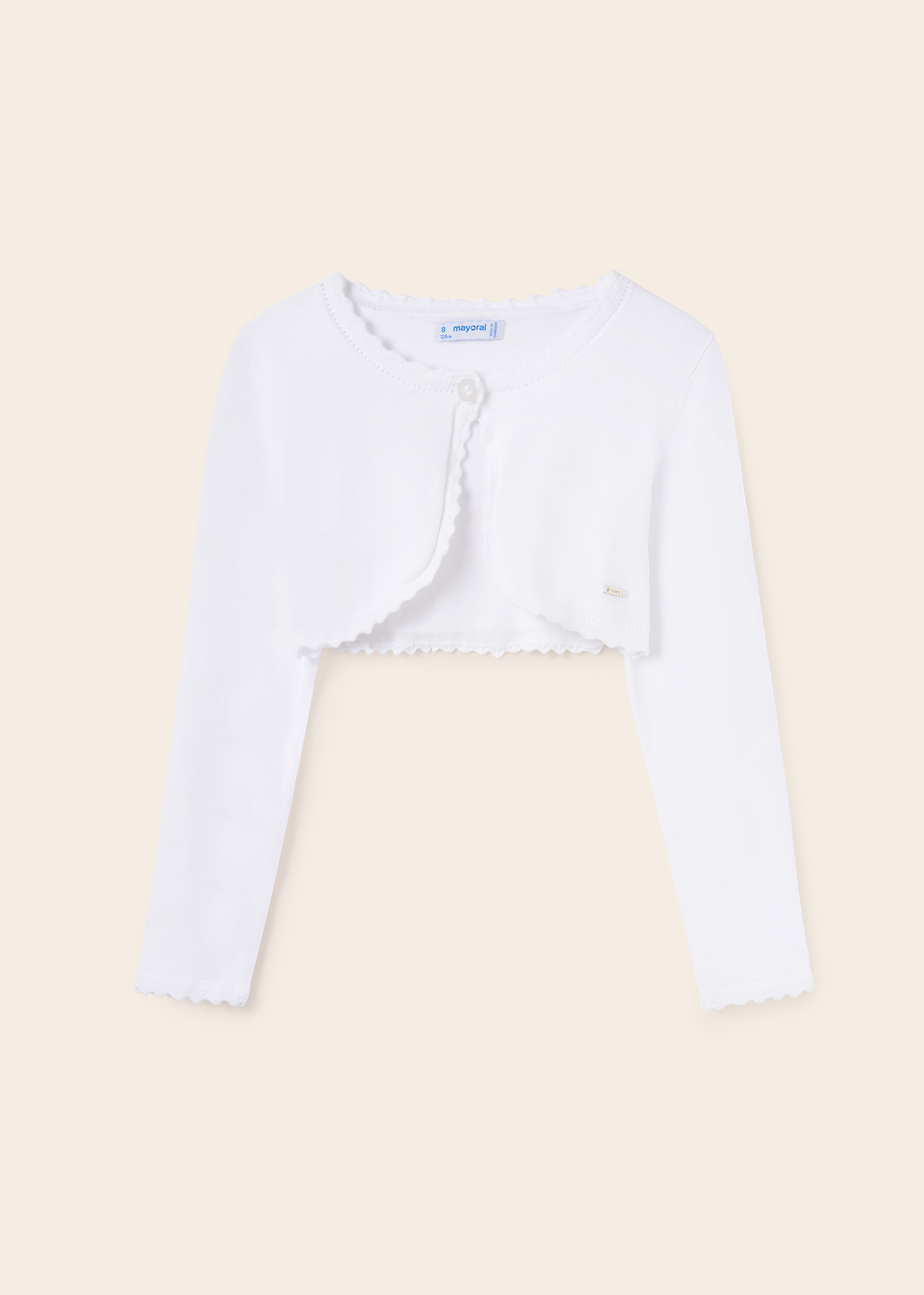 Casaquinho estilo bolero feito com algodão sustentável para meninas