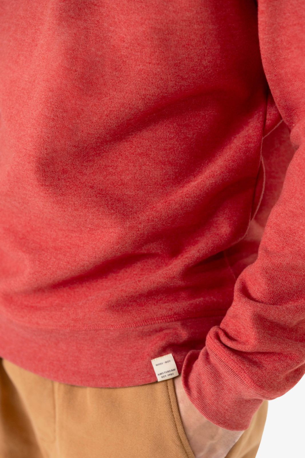 Rode sweater met hoge hals