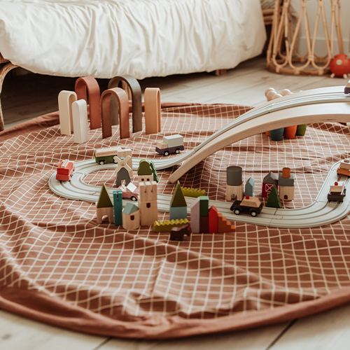play&go speelkleed en opbergzak noomad - grid brown