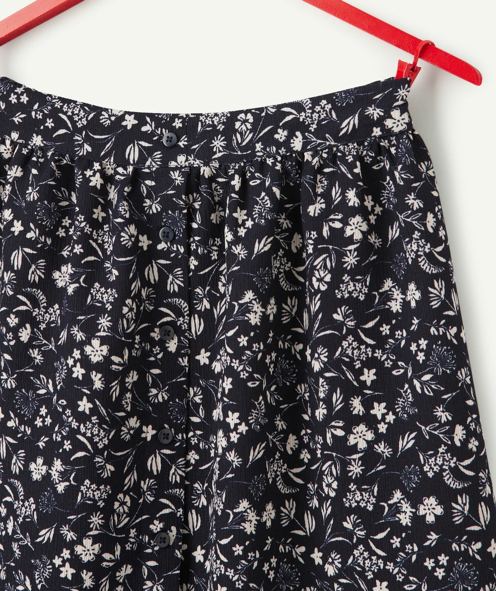JUPE BOUTONNÉE FILLE EN FIBRES RECYCLÉES BLEU MARINE ET IMPRIMÉ FLEURI BLANC