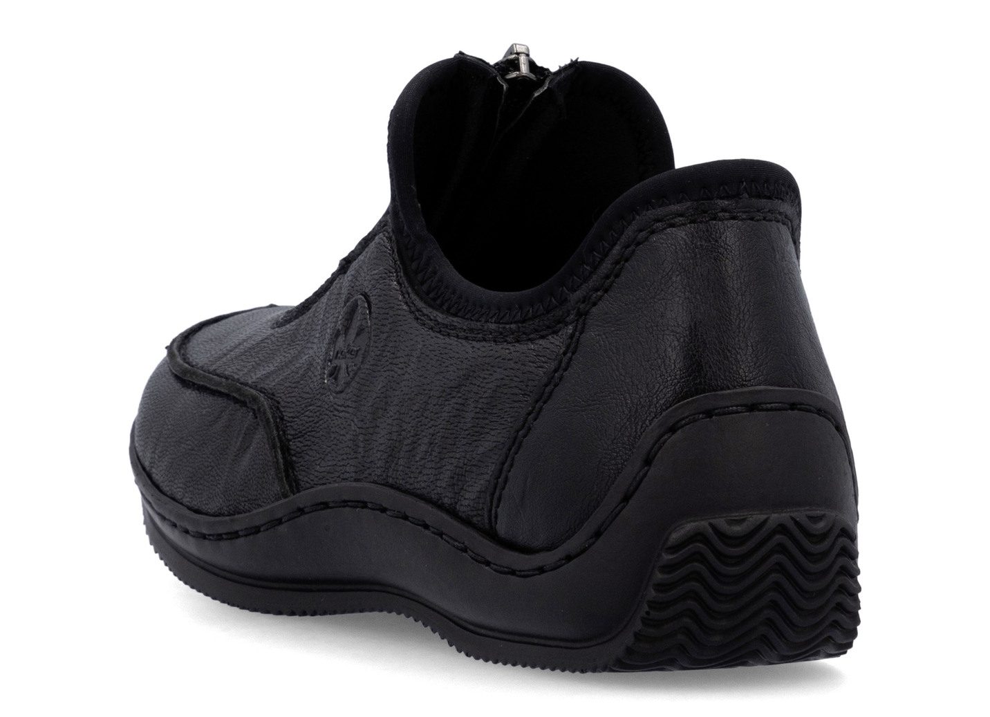 Rieker Slipper aus genarbtem Nappaleder und dehnbarem Textilmaterial