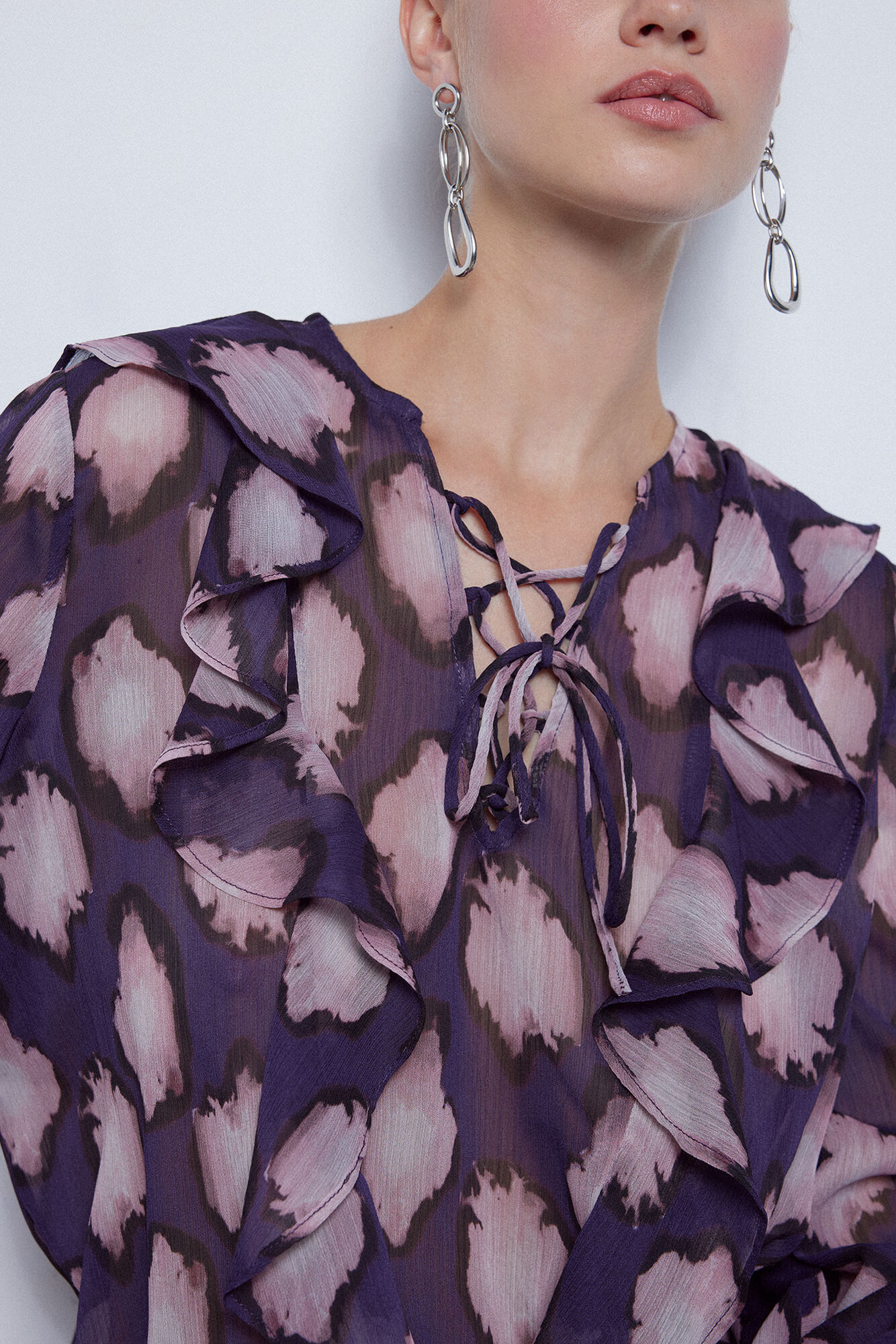 Blusa estampada com babados