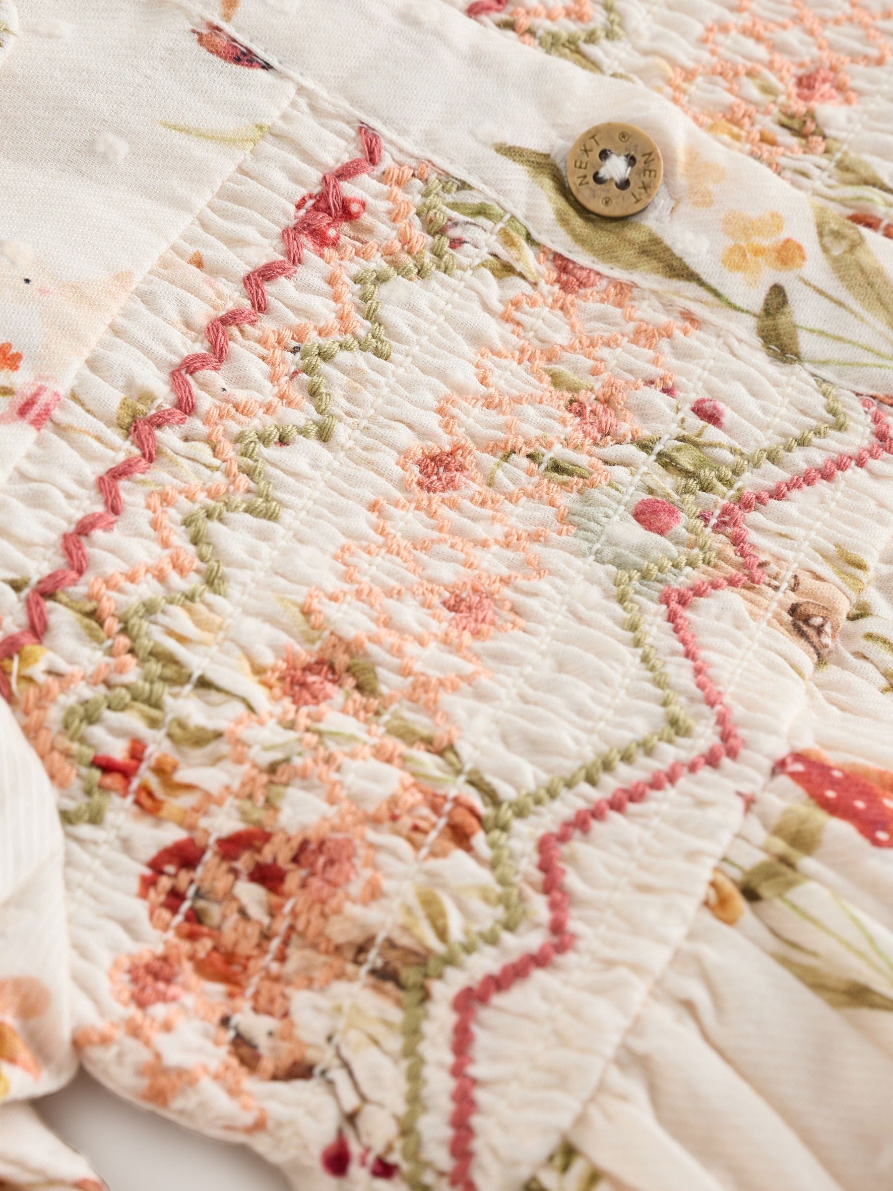 Crème bloemenprint/personage - Collar Baby Dress (0mths-2yrs)