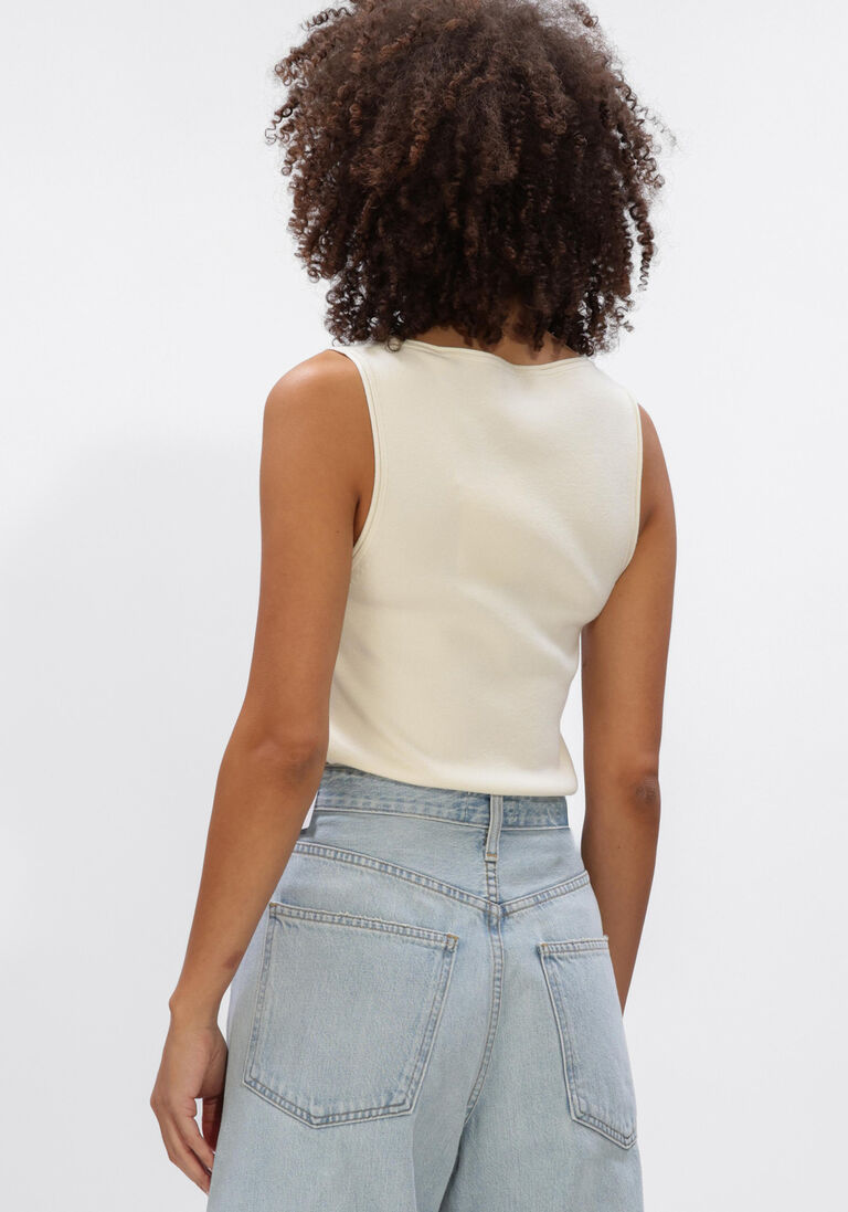 ecru olaf hussein top retro logo sleeveless knit