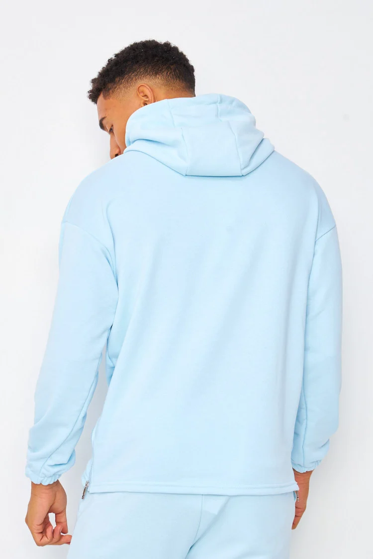 Sweat à capuche demi-zip bleu