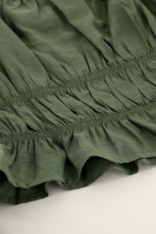 Donkergroene off shoulder top met ruffles