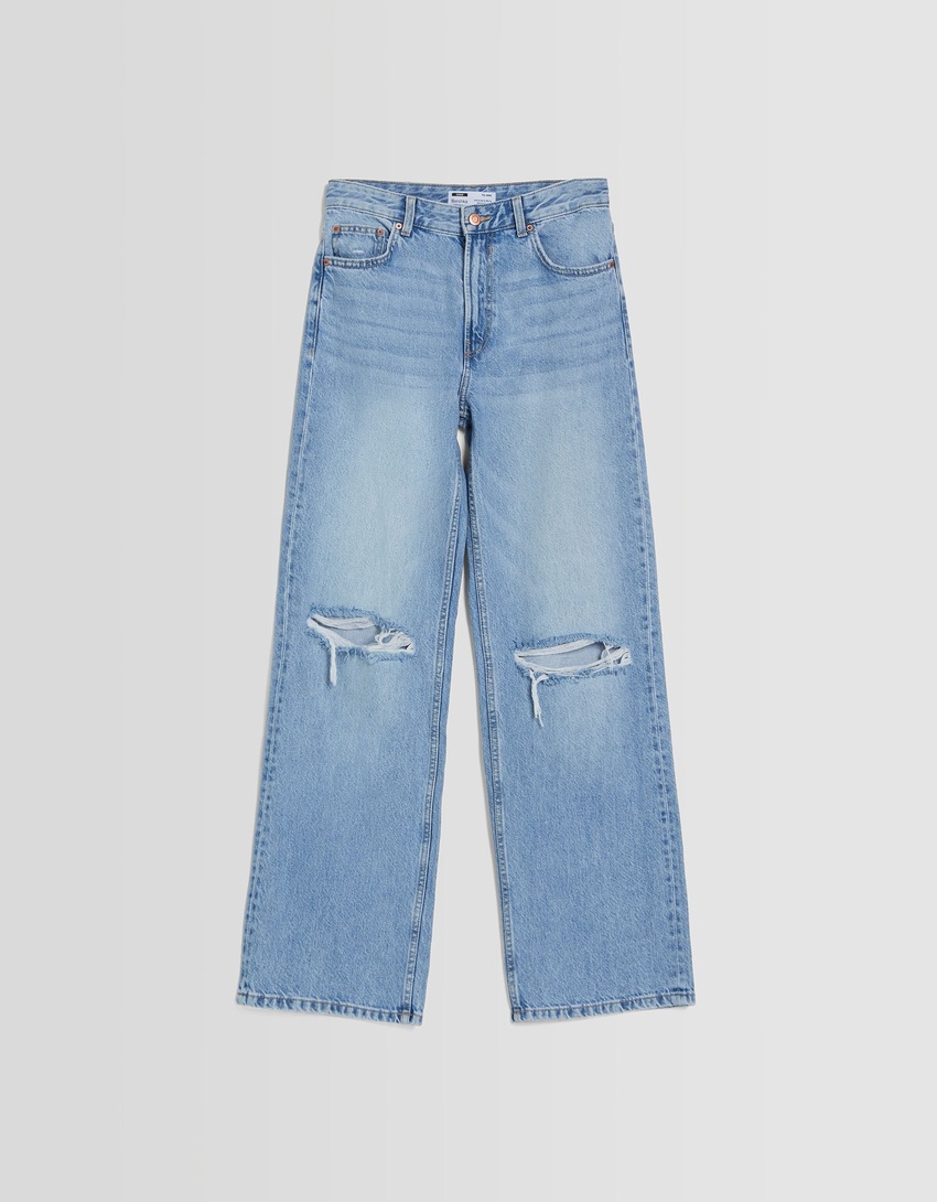 Calça jeans rasgada de perna larga dos anos 90