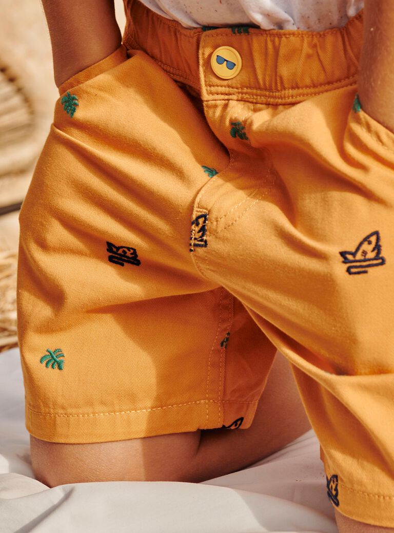 Short orange à imprimé requins et feuilles