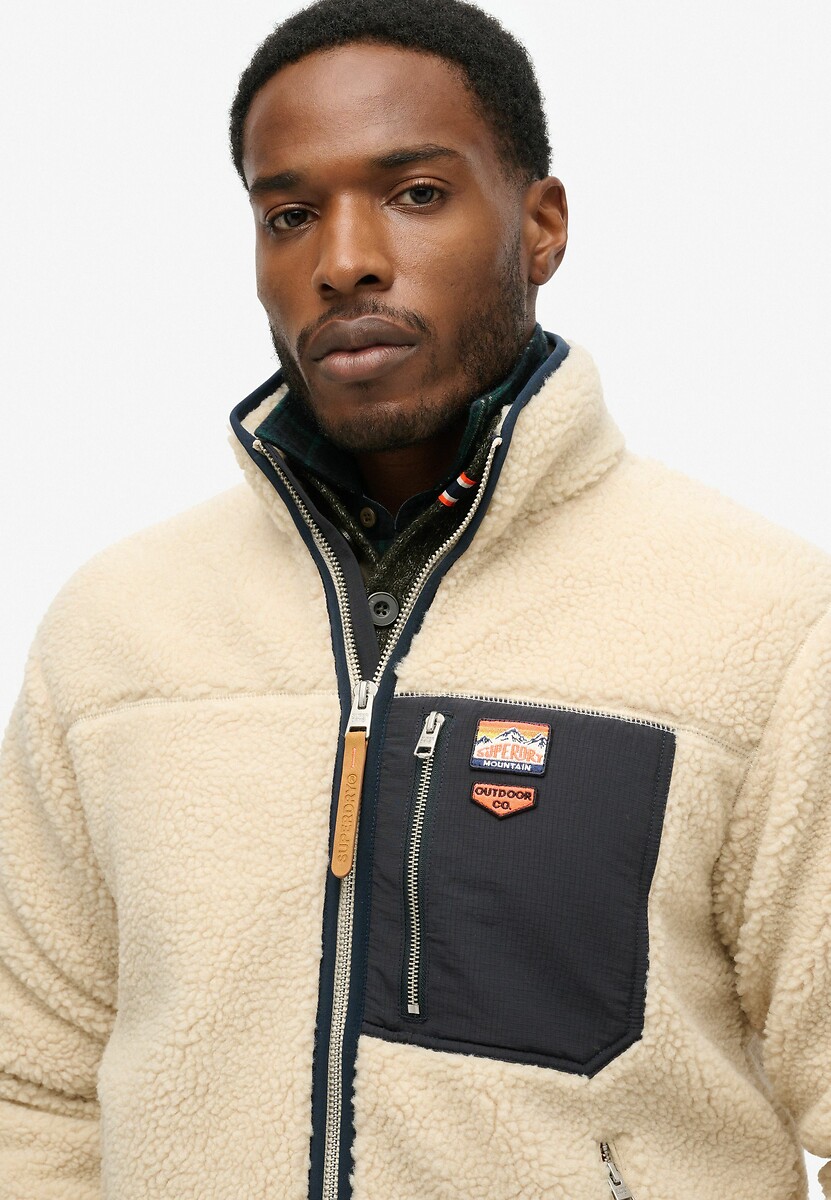 SUPERDRY<br>Lã Sherpa com zíper e bolso