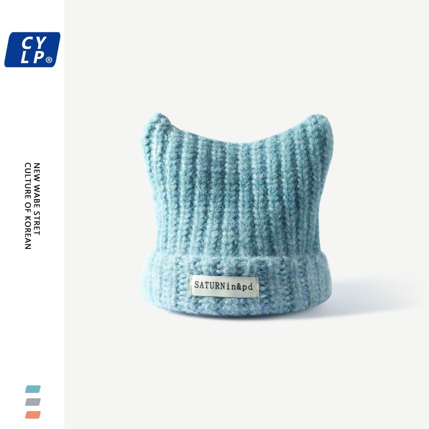HARPY - Gebreide muts met kattenoorletters en applicaties
