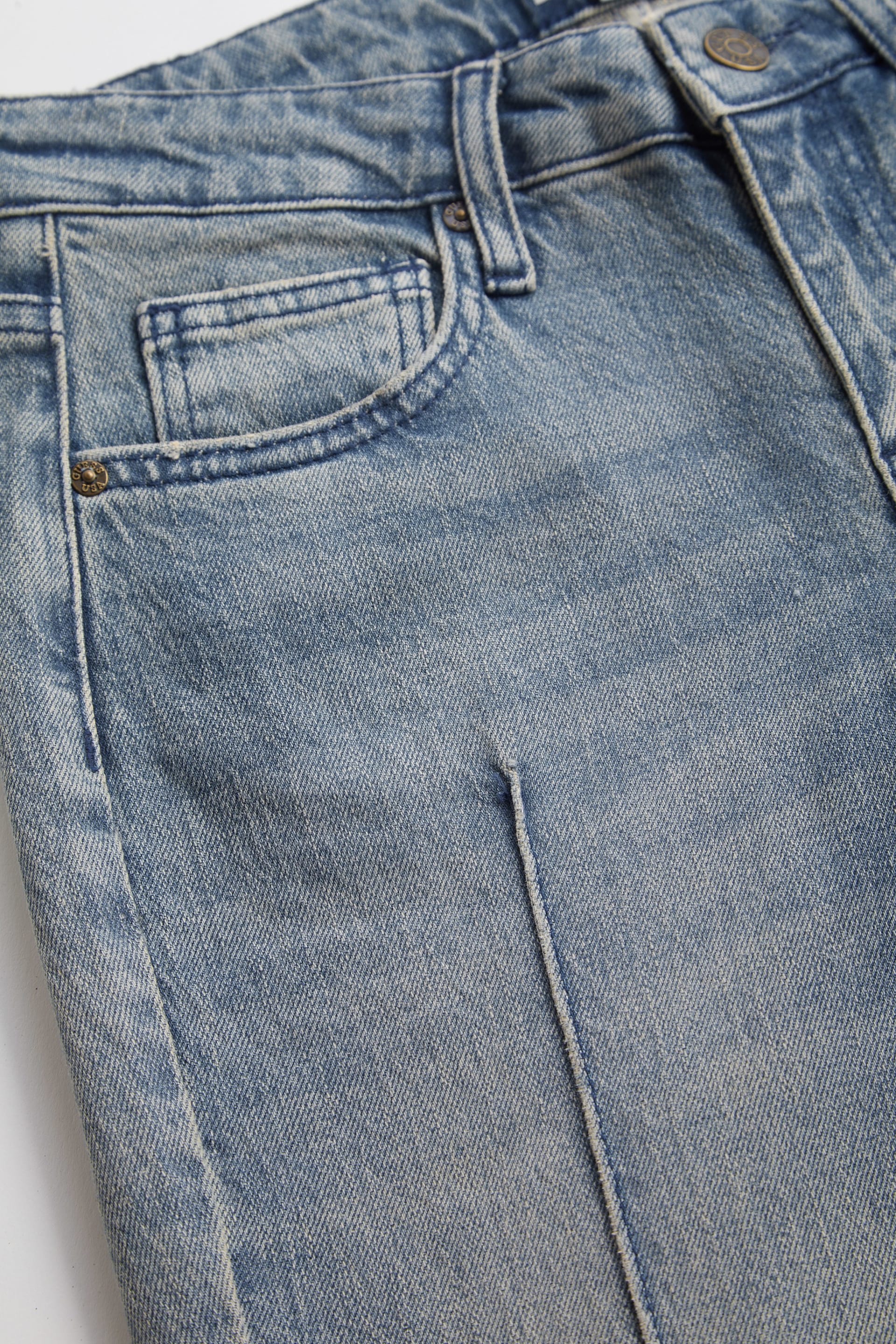 calça jeans flare