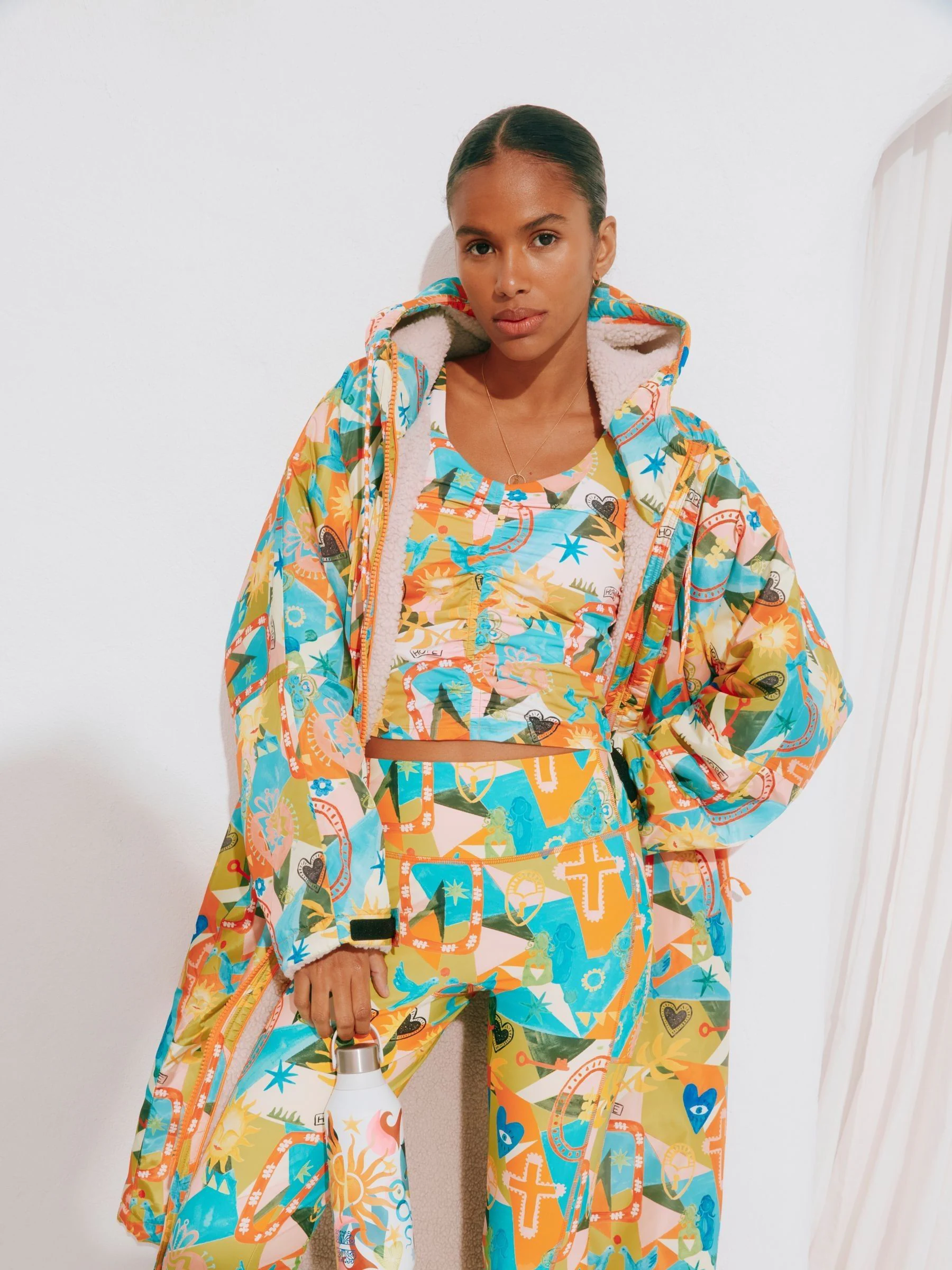 Bright Hope Oranje Print - Never Fully Dressed omkleedjas met borgvoering