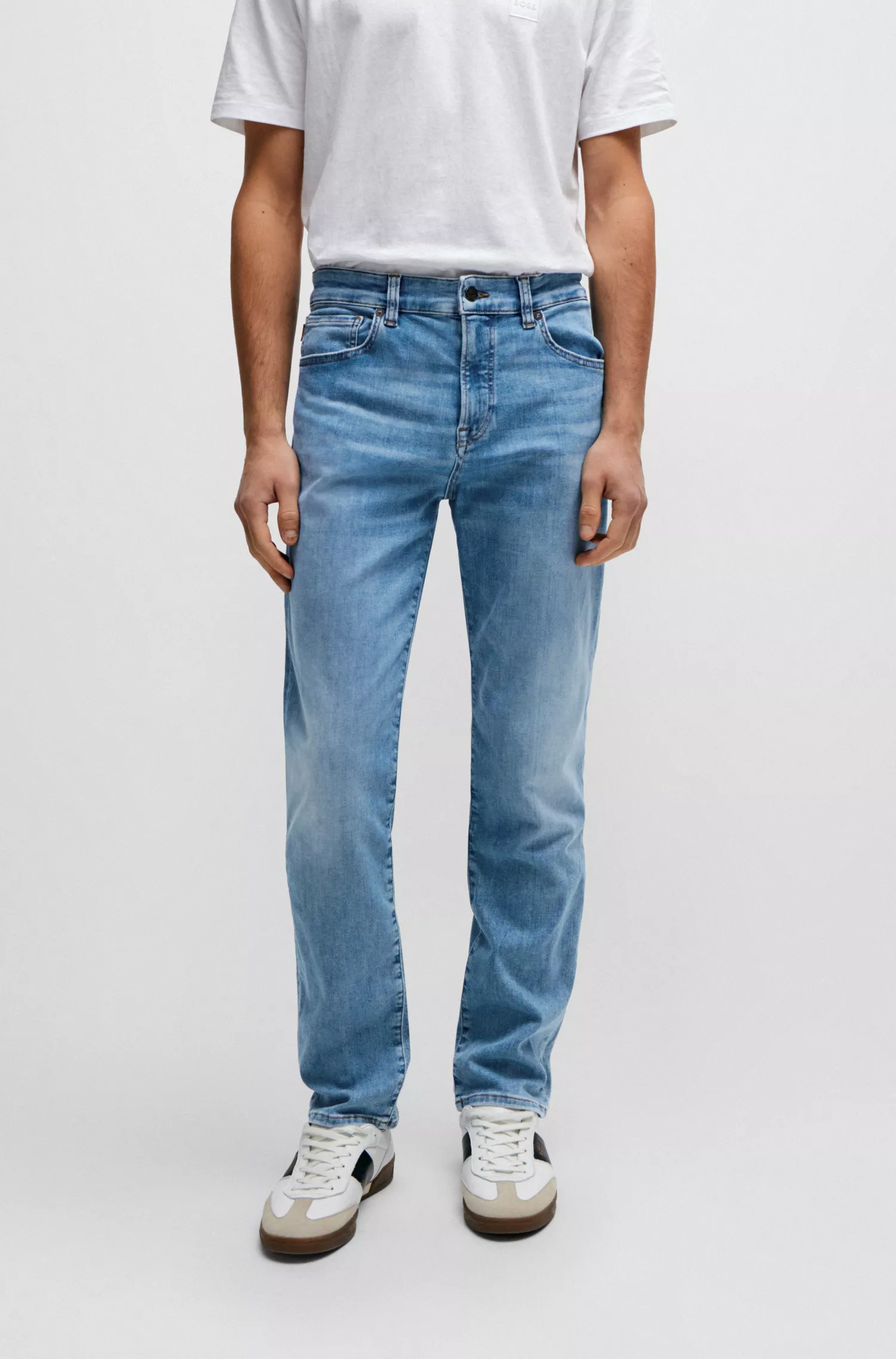 Calça jeans BOSS laranja, corte regular, em denim super elástico azul.