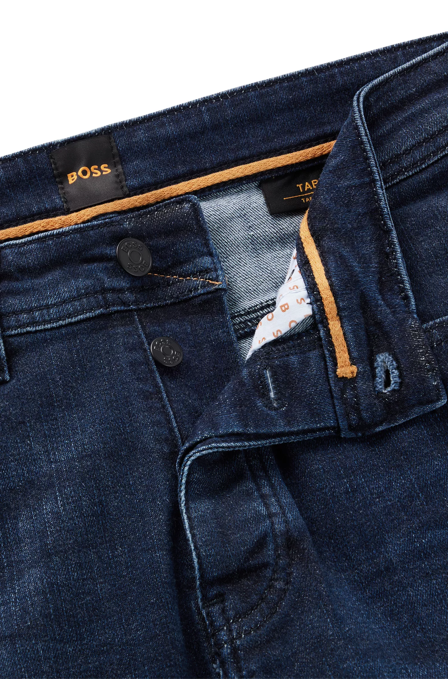 Calça jeans BOSS laranja, corte afunilado, em denim superelástico azul-escuro.