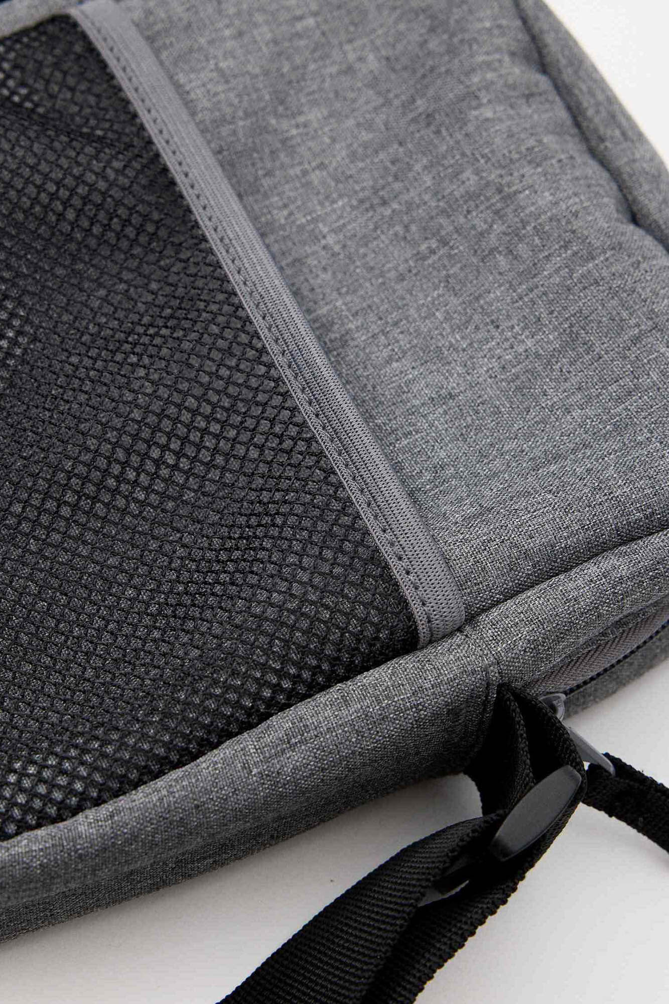 Bolsa transversal masculina