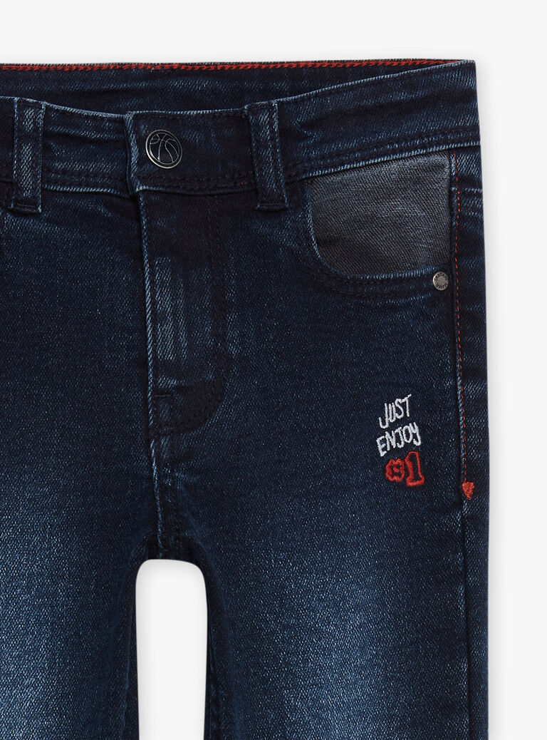 Jean slim denim brut brodé