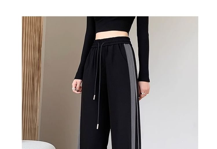 PERKARP - Wijde joggingbroek met trekkoord in de taille en contrasterende afwerking