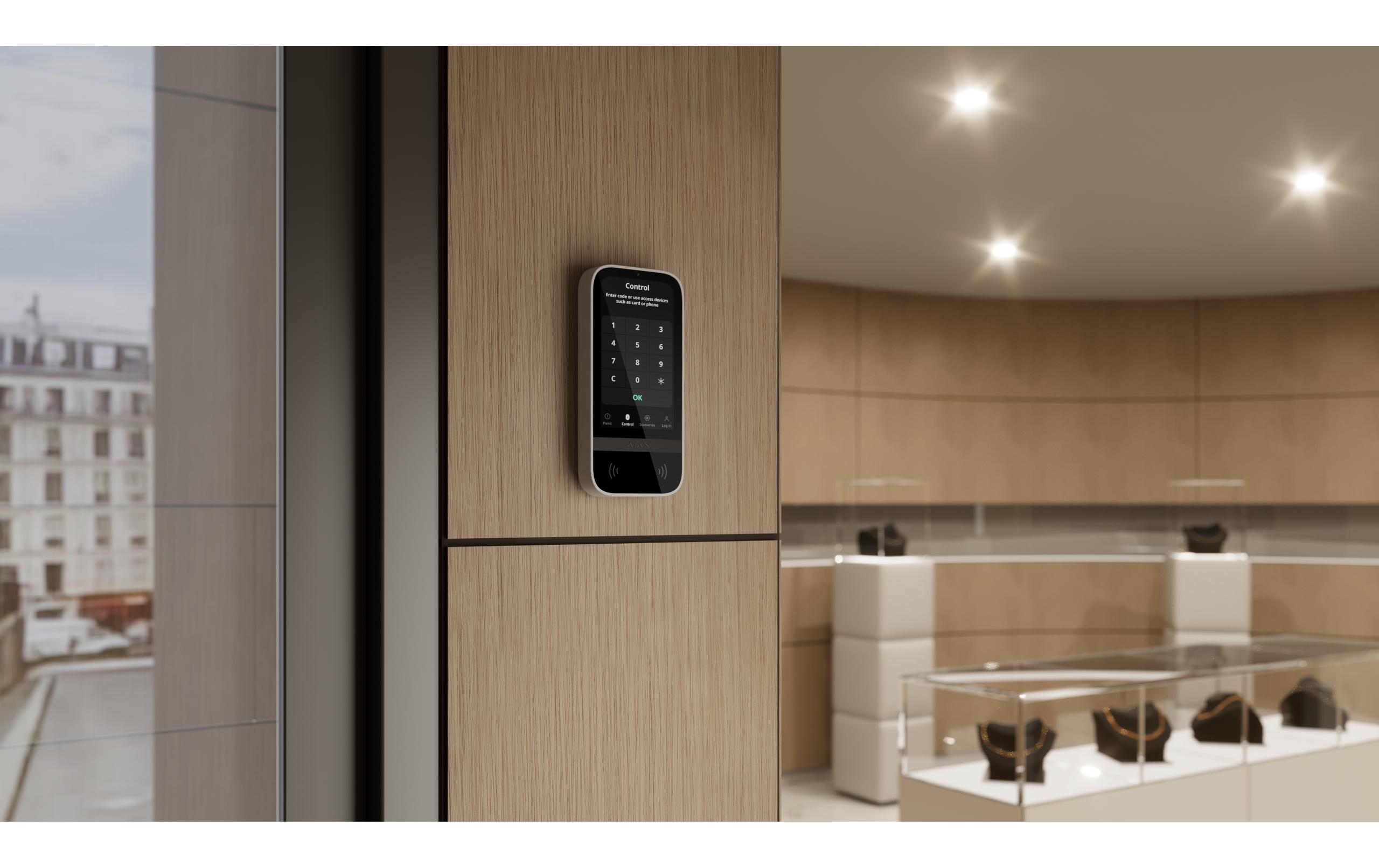 LCD-Bedienteil Baseline KeyPad TouchScreen Jeweller Weiss<br>Kabelloses Bedienteil mit Touchscreen für die Steuerung eines Ajax-Systems
