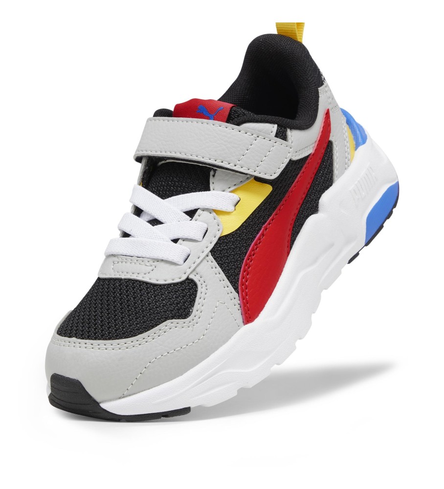 Tênis Puma Trinity Lite de couro, cinza e vermelho.