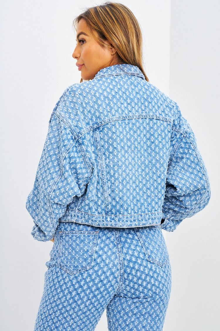 Veste courte en jeans bleue à trous