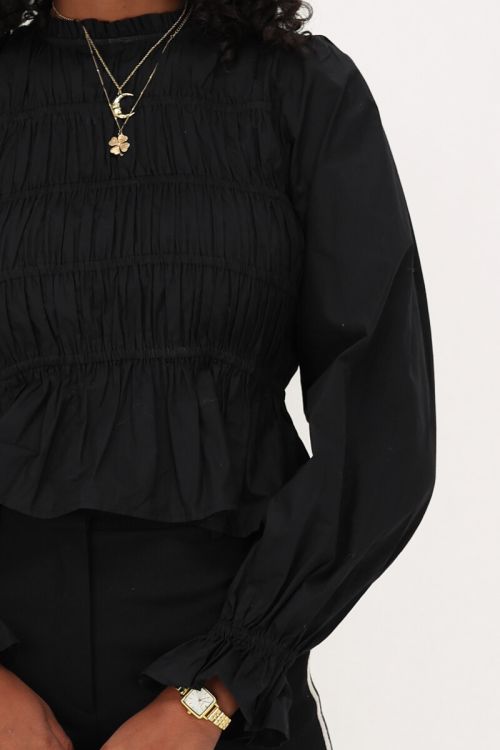 Zwarte getailleerde blouse met pofmouwen