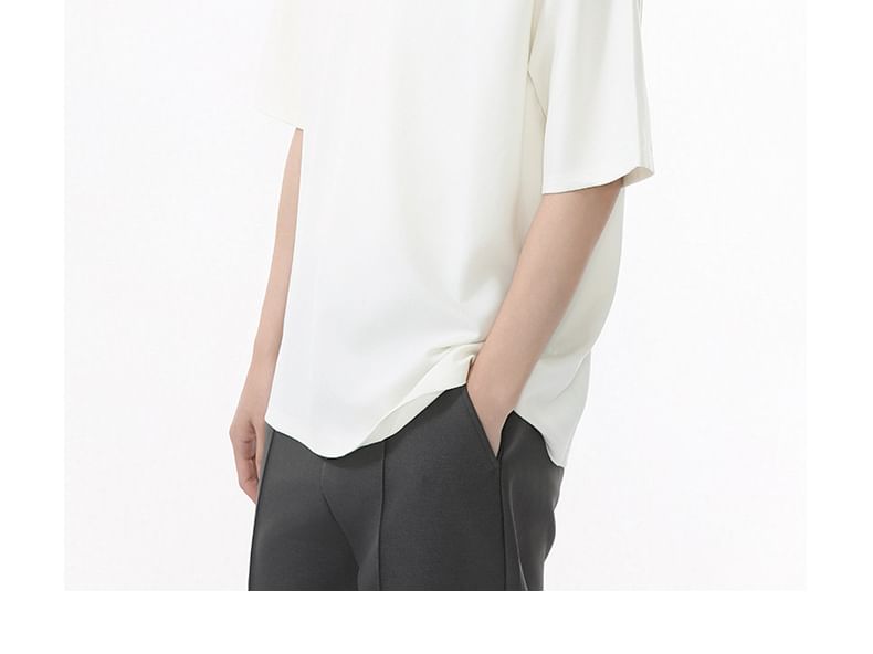 FAERIS - T-shirt met korte mouwen en korte ritssluiting