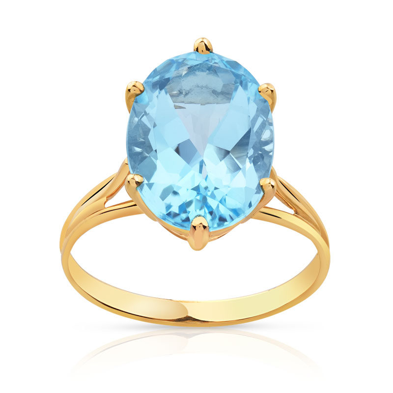 Bague or 750 jaune topaze bleue traitée ovale
