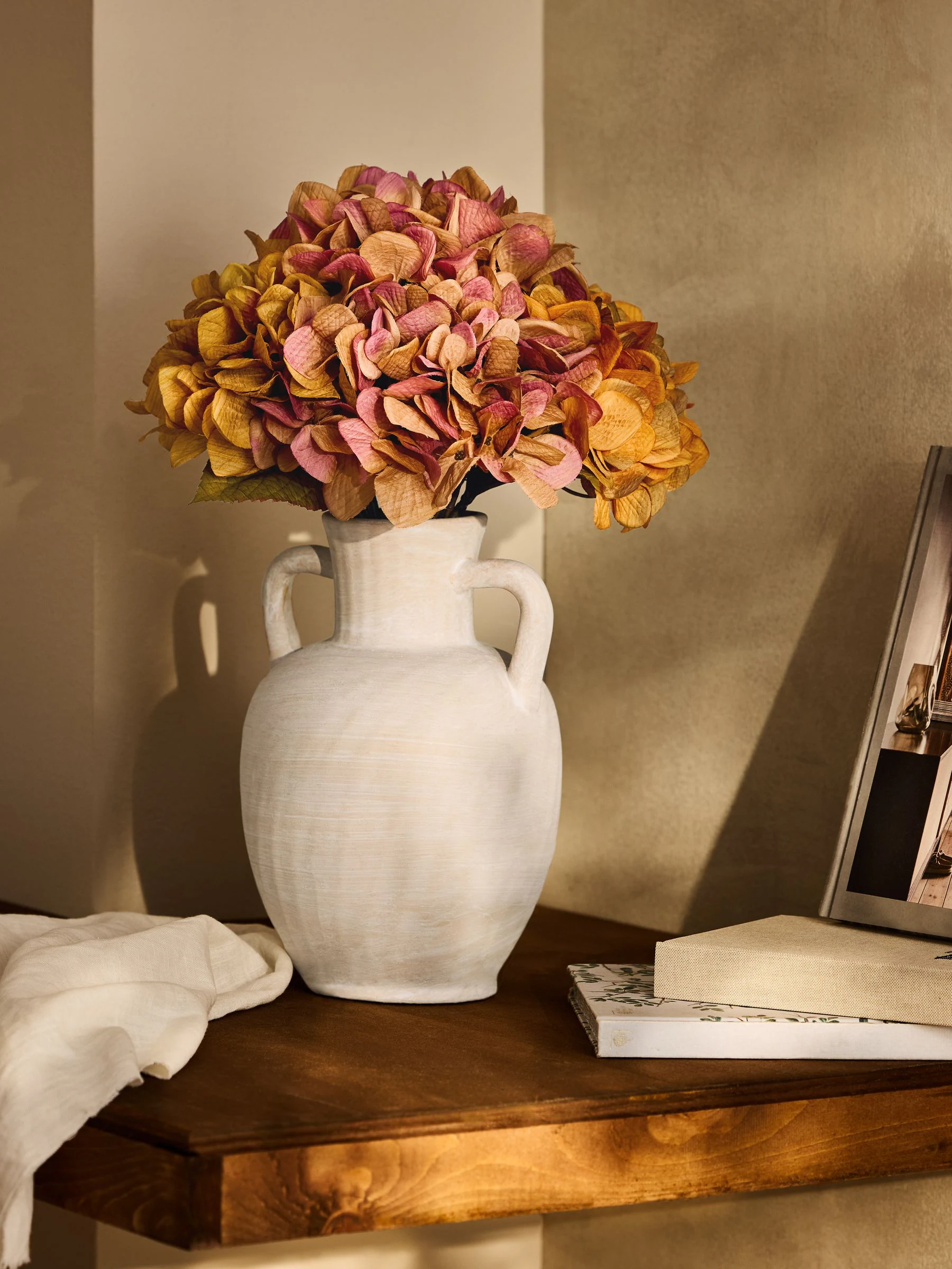 Artificial Hydrangea Heads In Large Ceramic Urn Vase