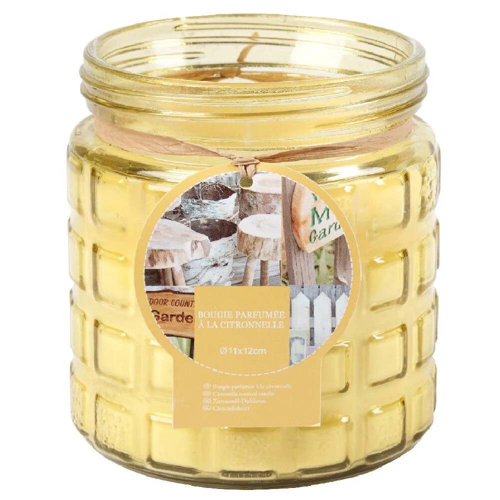Bougie à la citronnelle dans pot en verre jaune