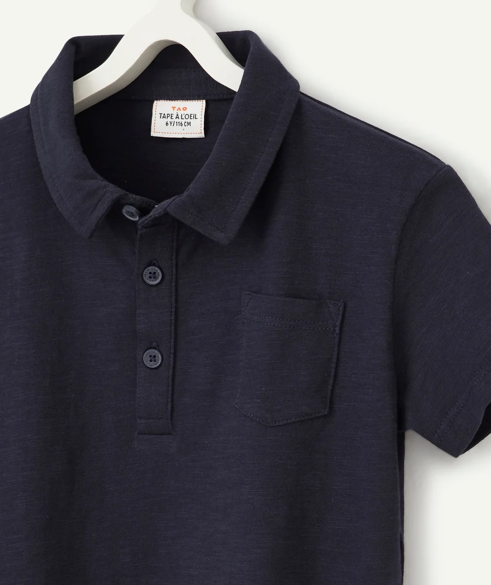 LE POLO MARINE AVEC POCHE SUR LE COEUR