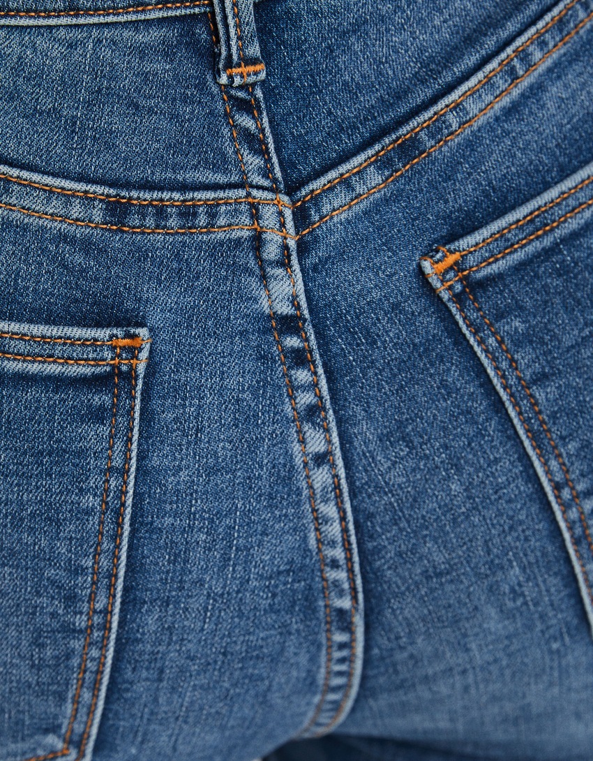 calça jeans skinny de cintura super alta