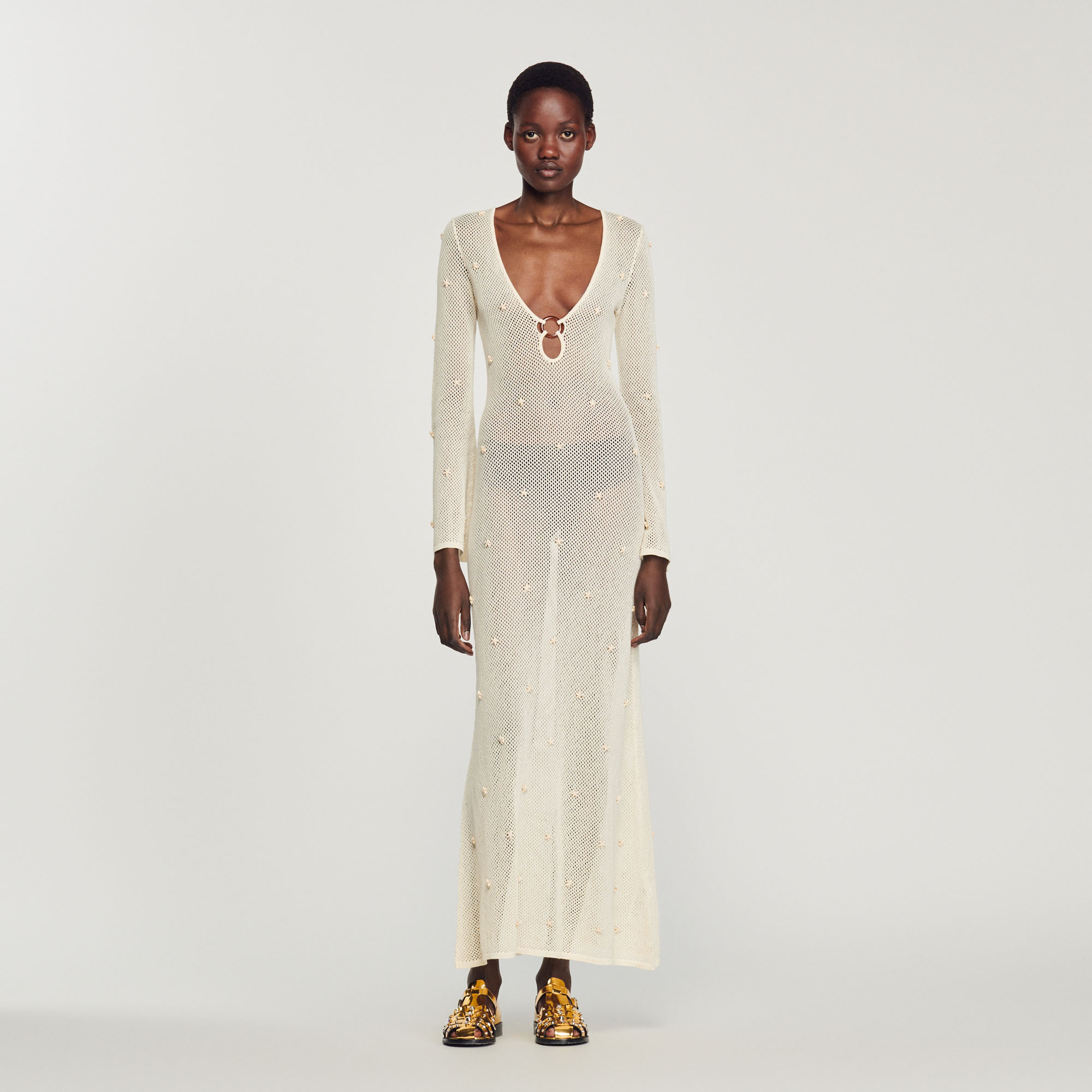 Robe longue en resille á pampille