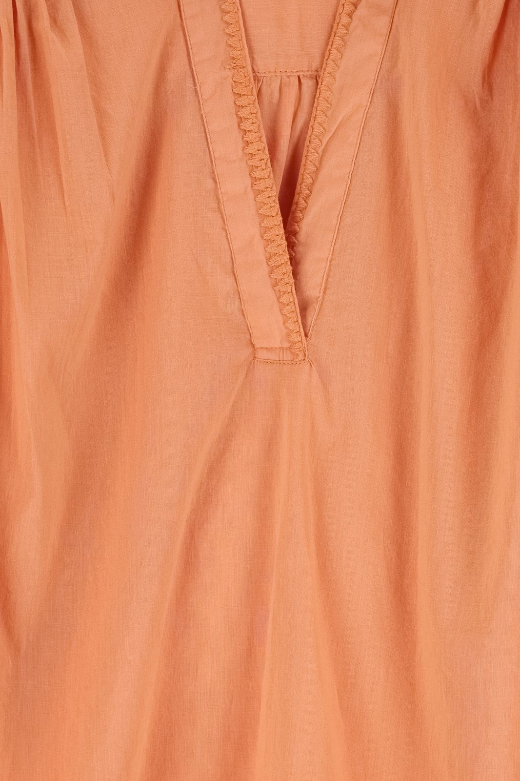 Oranje blouse met plooiing