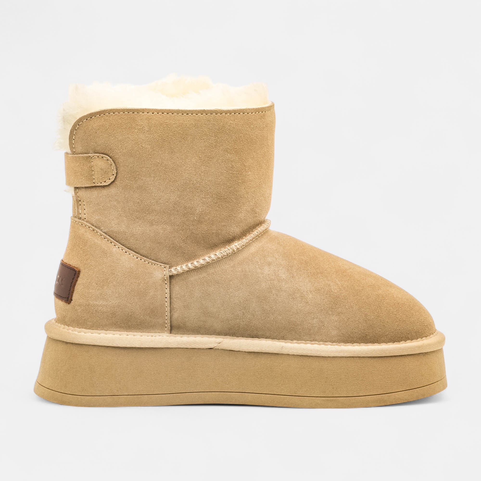 Boots Femme en cuir beige
