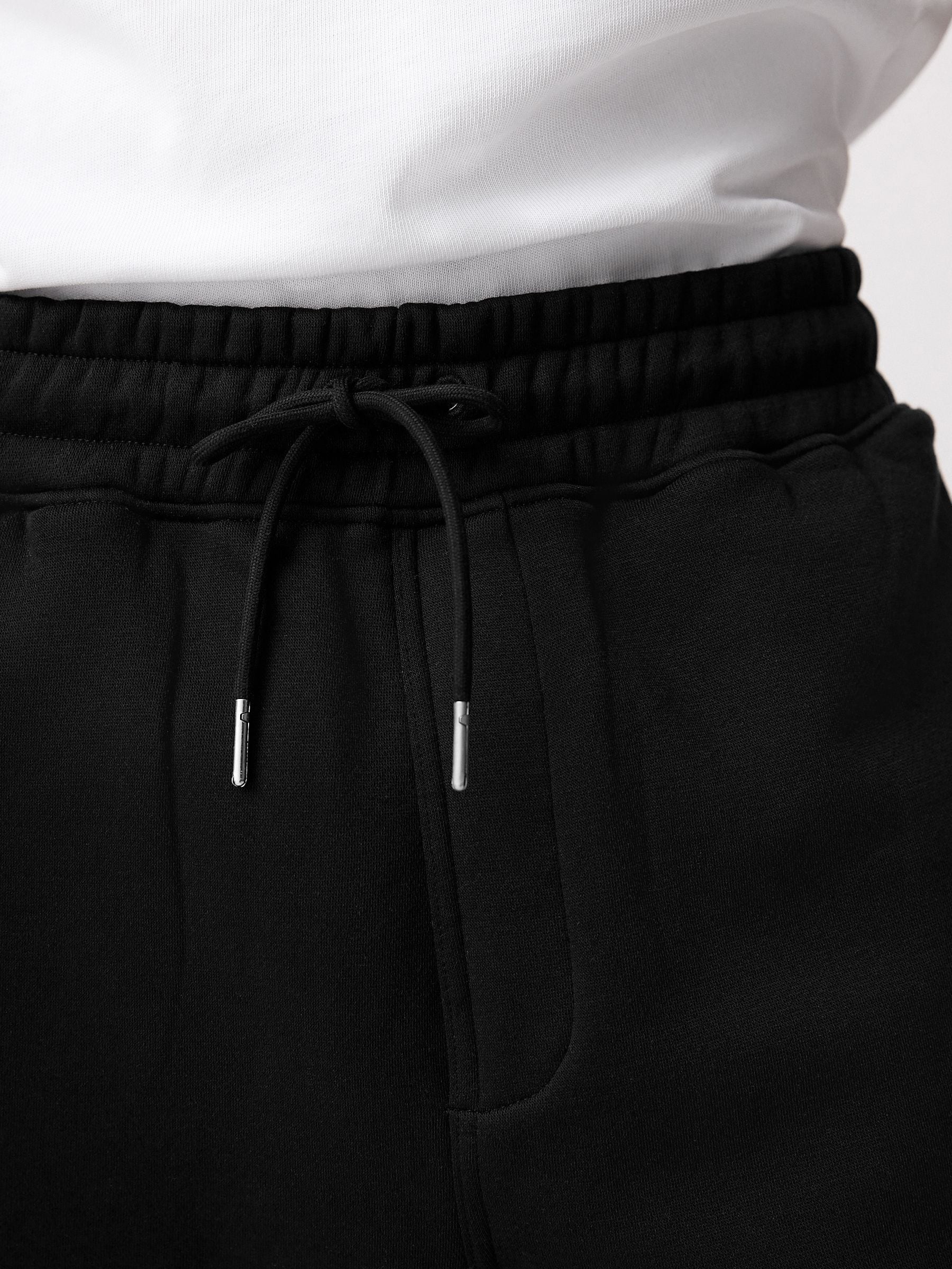 Zwart - Geborstelde jersey shorts met ritszakken
