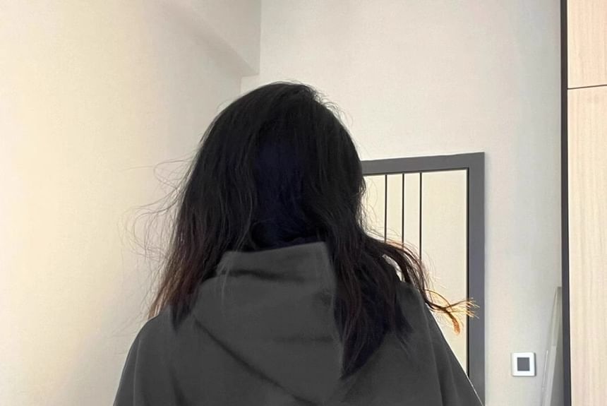 Carotaine - Oversized hoodie met hartprint en rits