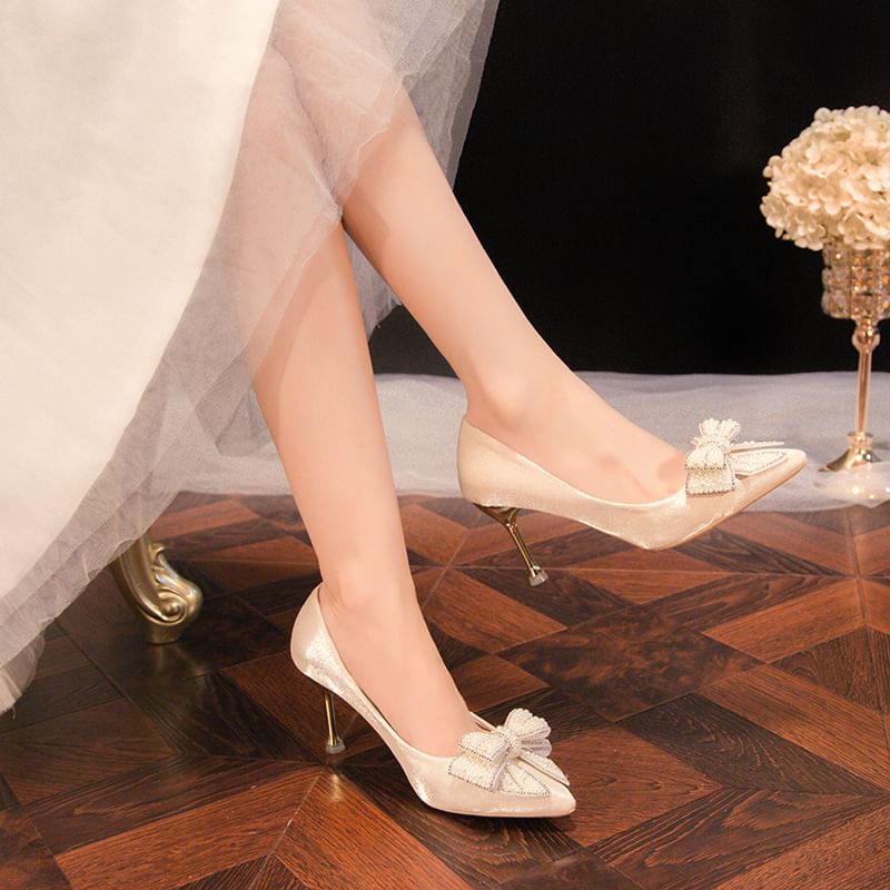 Silverslyre - Pumps met puntige neus en strik van imitatieparels en strass
