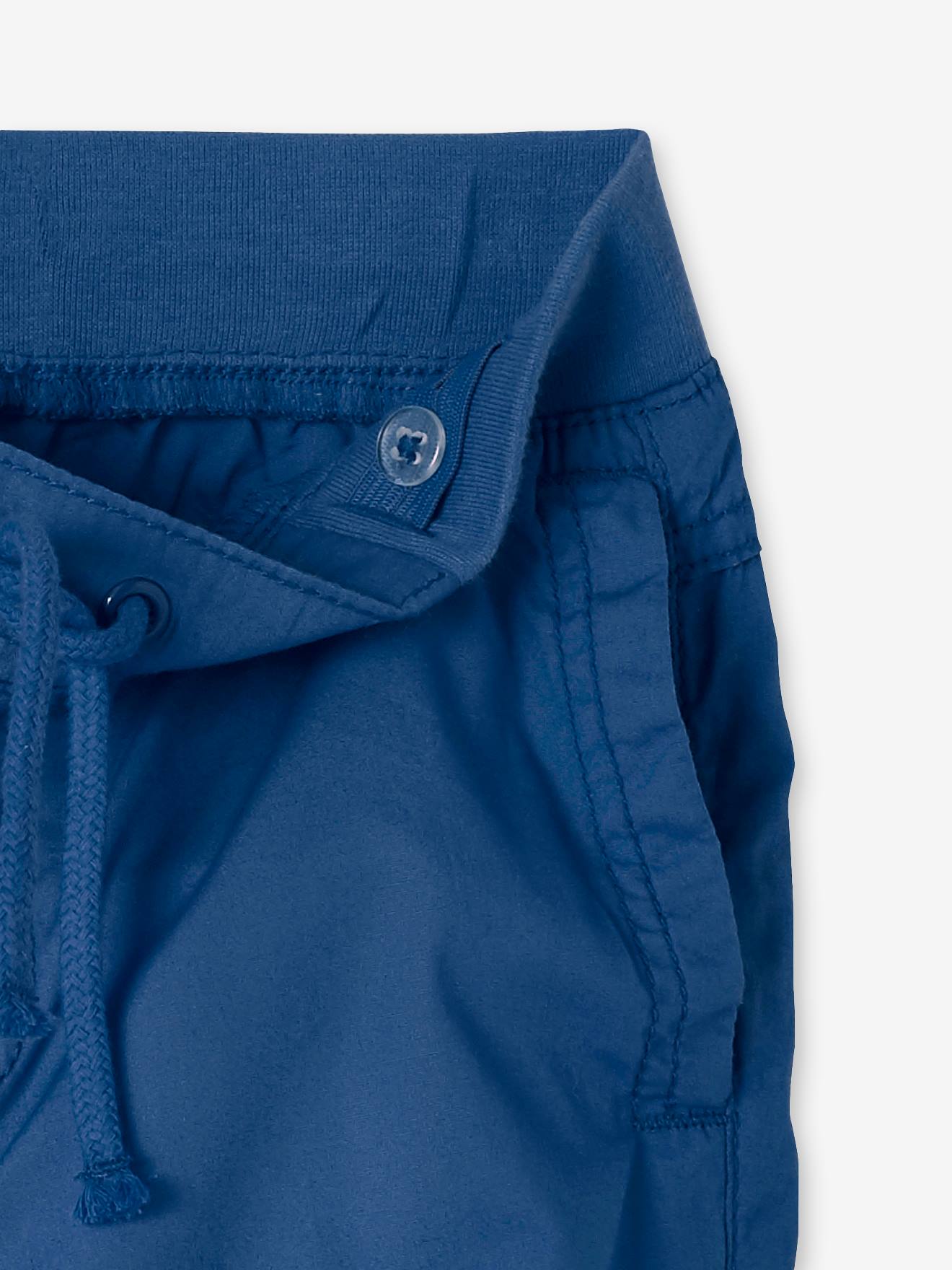 Calça cargo bege que se transforma em bermuda para meninos