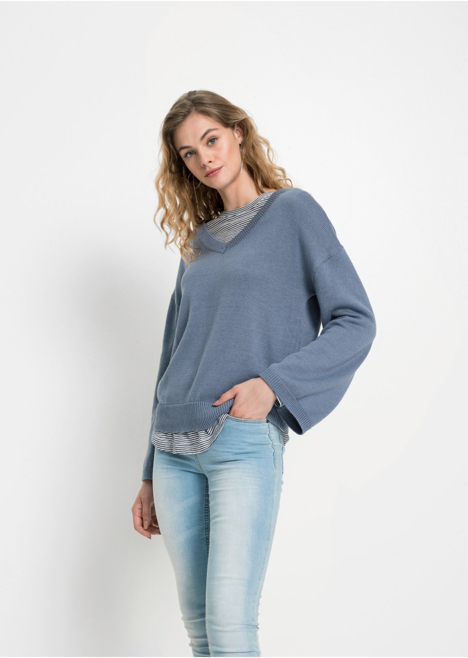 Pull à détail nœud et manches amples