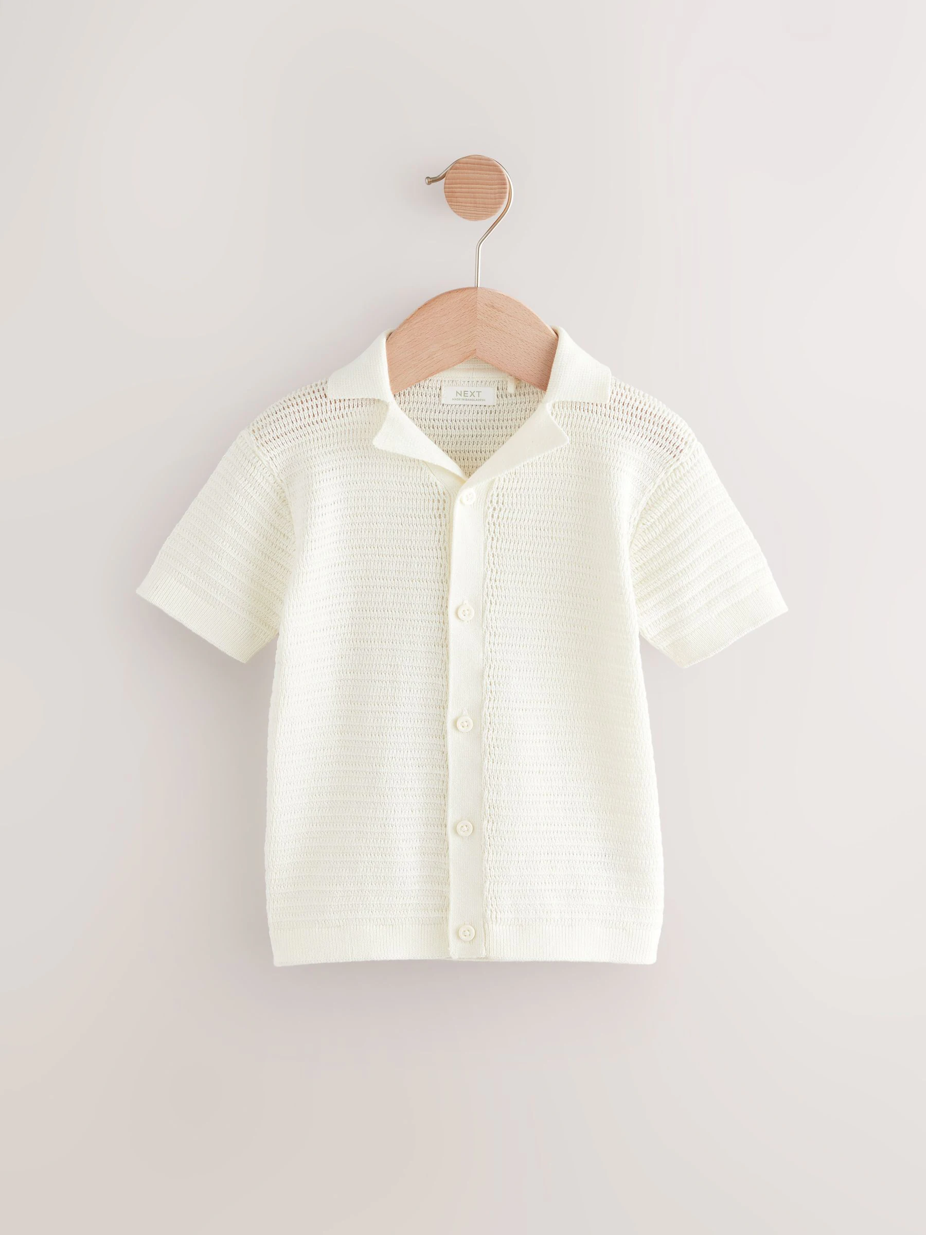 Wit - Poloshirt met textuur, reverskraag en korte mouwen van 100% katoen (3mnd -7jr)