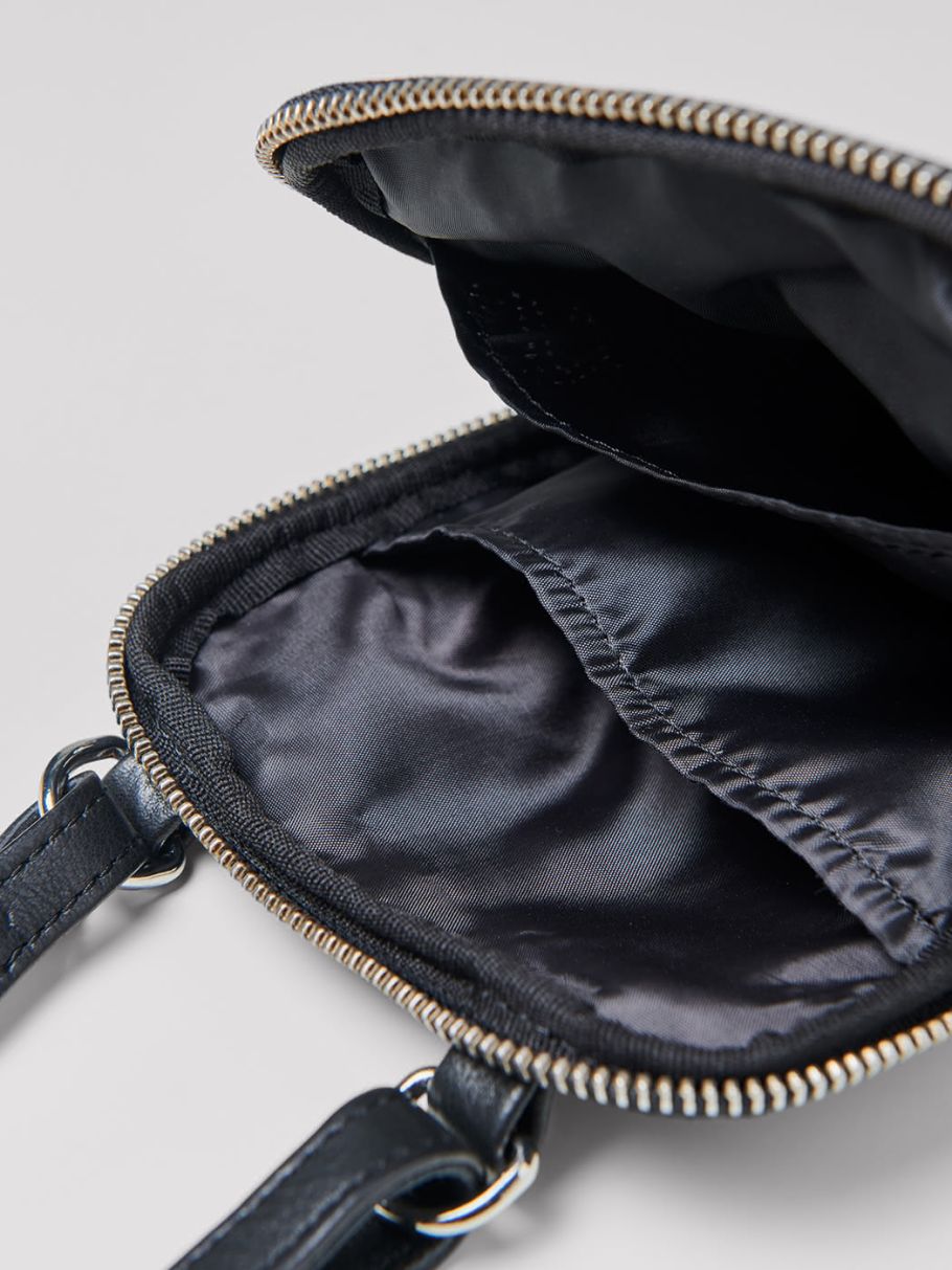 Petit sac bandoulière en cuir uni