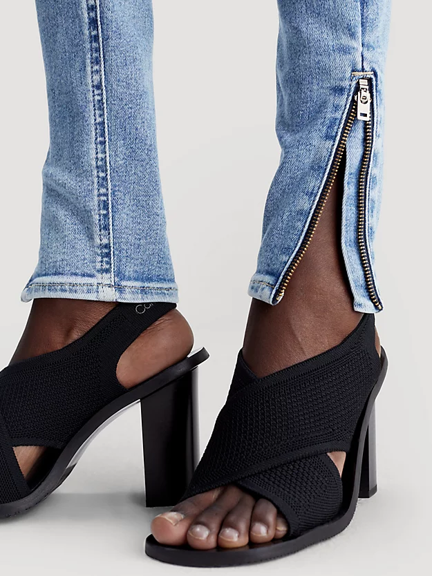 Calça jeans super skinny de cintura alta com zíper na barra