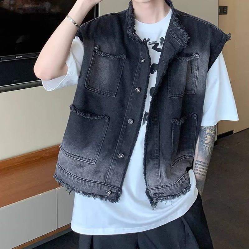 Maxelane - Gewassen denim vest met kwastjes en knoopjes