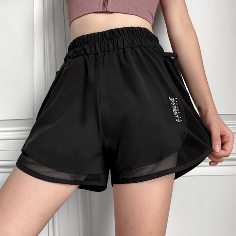 Dshe - Elastische taille, letters en split, joggingbroek