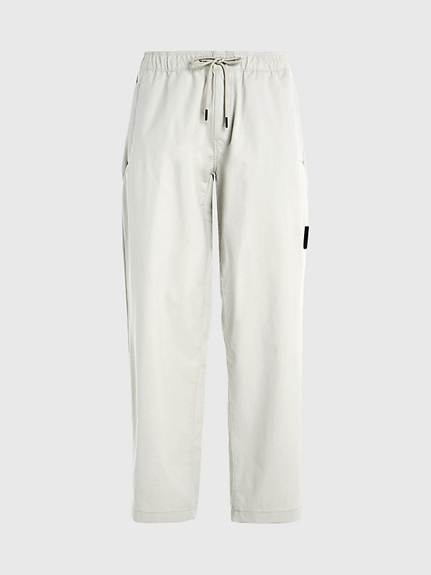 Calças retas em nylon técnico