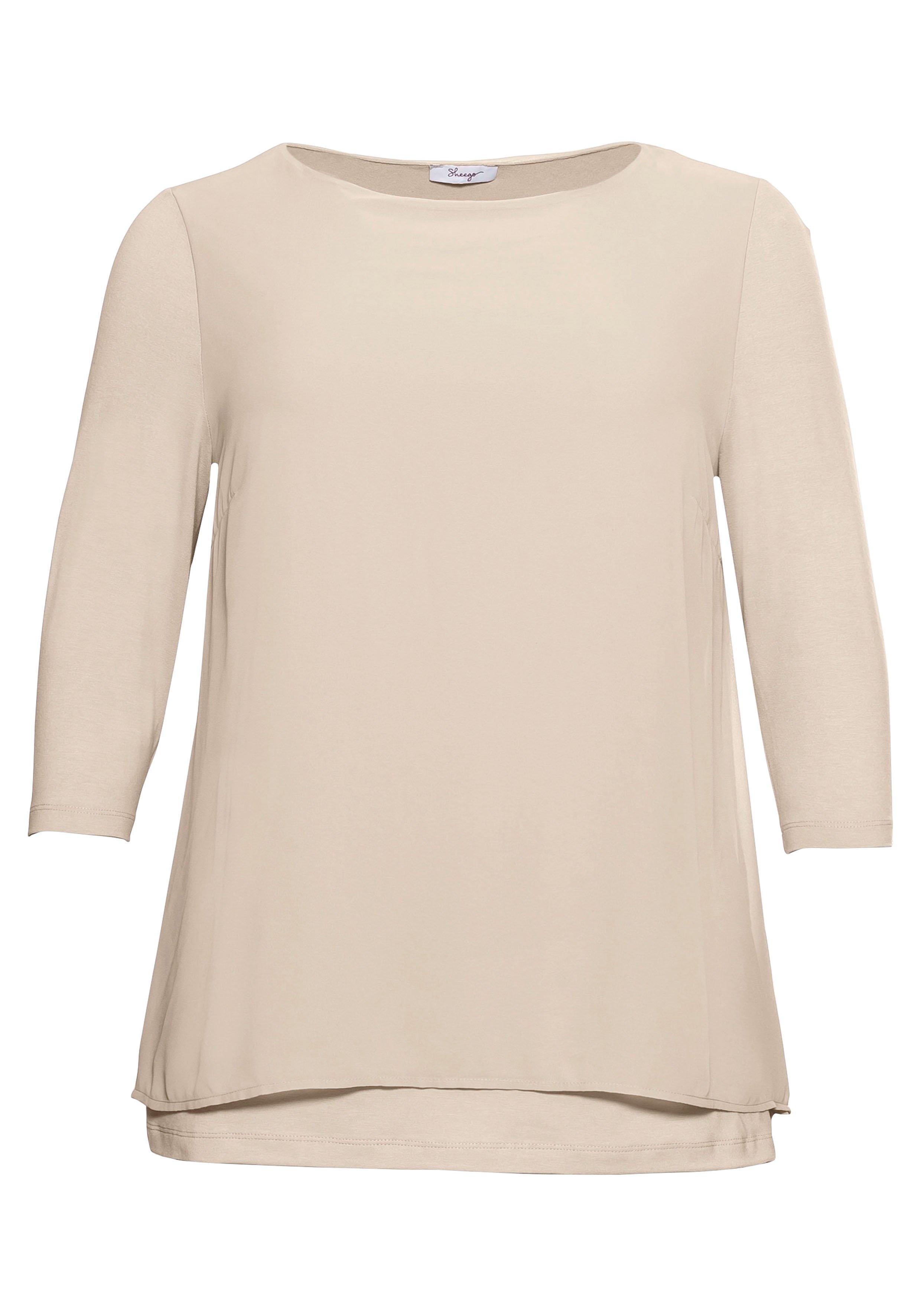 Blusenshirt in leichter A-Linie mit Zipfelsaum